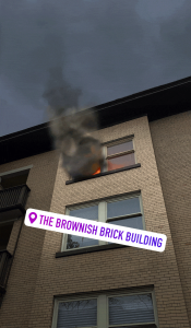 The brownish brick building.